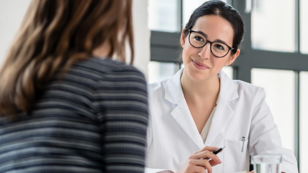 Doctor talking to patient